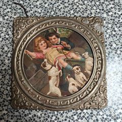 Vintage picture of children with puppies, late Victorian.