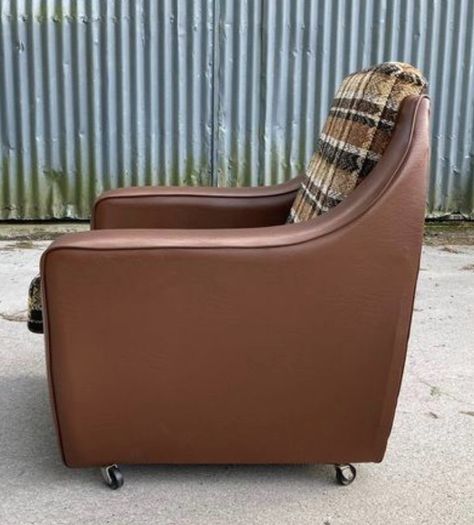 Vintage 1970s armchair on castors.