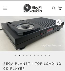 Mega Rare 1st edition Rega Planet CD Player Audiophile Quality one of the greatest Analog Sounding players ever made in great condition with original Remote Stunning