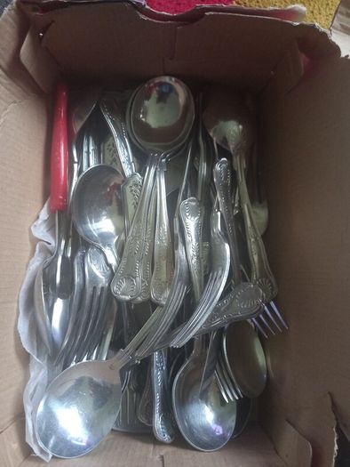 Box of spoons forks knifes