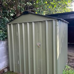 Green metal garden shed