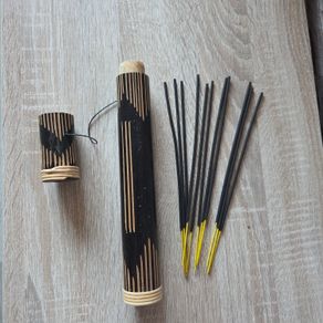 wooden incense holder tube and a small bundle  incense sticks