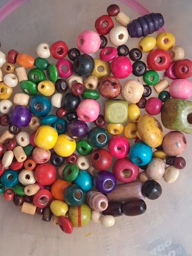 Stunning mixed style and colour wooden bead bundle of approx 150 beads.