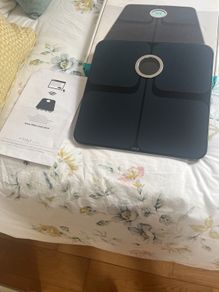 weighing scales FitBit and FitTrack