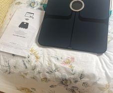 weighing scales FitBit and FitTrack
