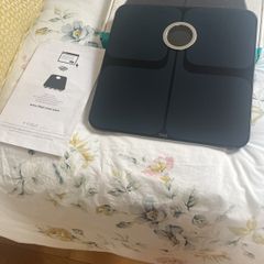 weighing scales FitBit and FitTrack