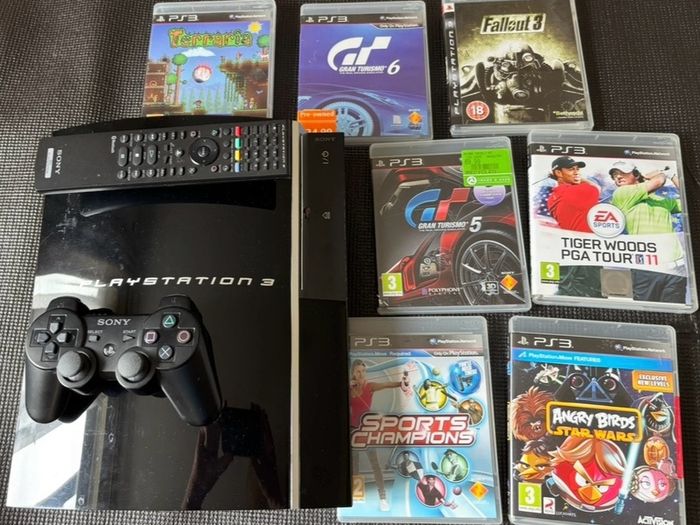 PS3 + Controllers + Games
