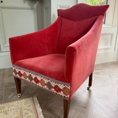 Restored vintage armchair in Colefax & fowler