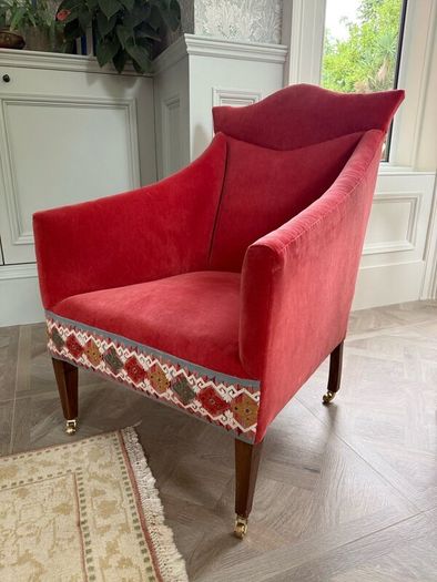 Restored vintage armchair in Colefax & fowler