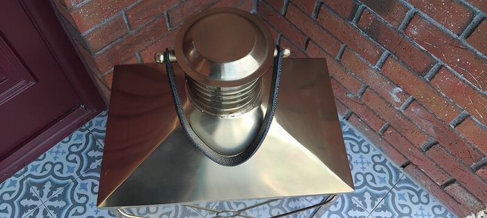 Large brass lantern with strap handle