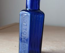 Rare Not To Be Taken 1/2oz blue glass bottle