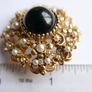 Vintage Victorian revival gold  layered domed brooch with black glass and faux pearls Image 10