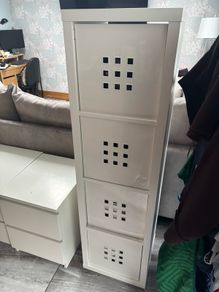 White Kallax 4 cube unit with hard plastic boxes