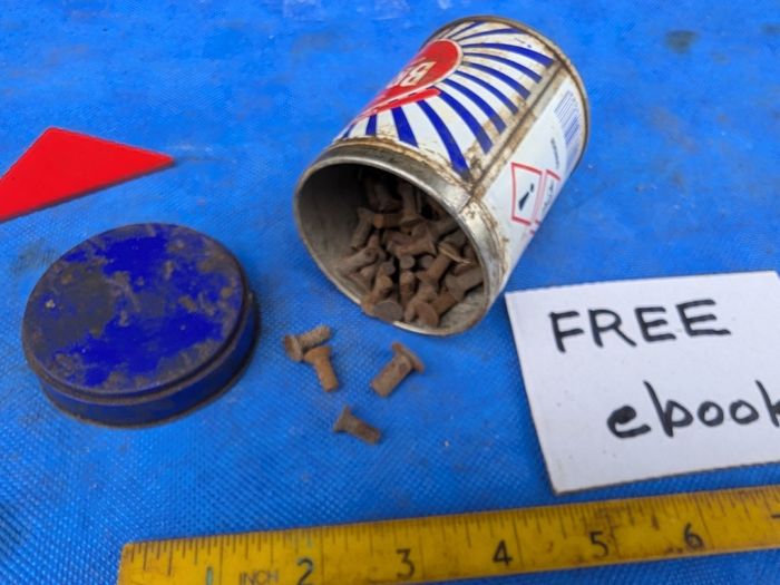 100 rivets in a Brasso Tin