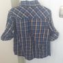 Shirt with sleeves that can be rolled up and buttoned. Image 3