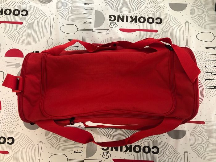 This is a Brand New Nike bag - Red & Black