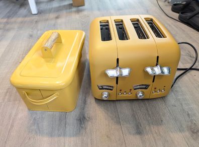 Mustard yellow 4 slice toaster and bread bin
