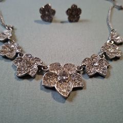 Silver tone necklace and stud earrings