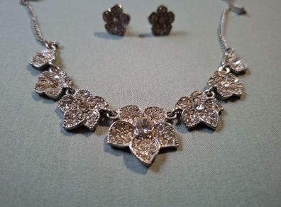 Silver tone necklace and stud earrings