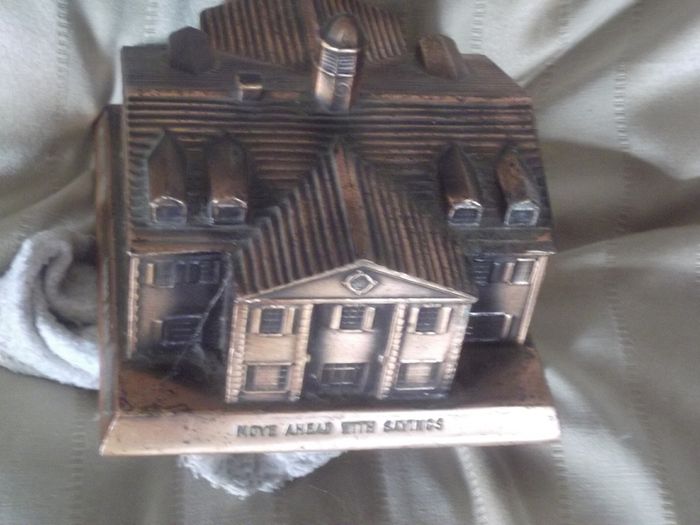 a vintage saving money box for arlington height federal savings