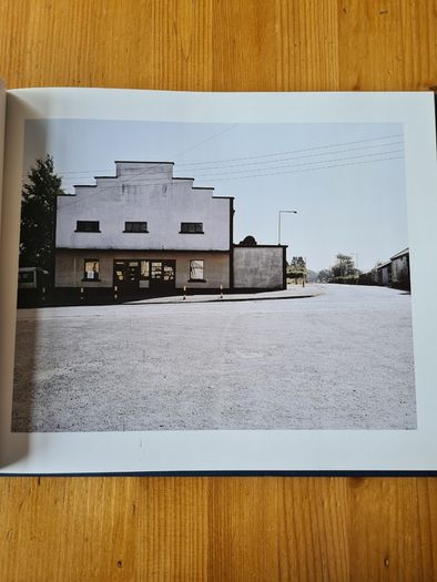 Under A GREY Sky. By Simon Burch. This Book Of Photos  Follows The landscape,people, & Towns Affected By The Collaps Of Board Na Mona's Peat Mining  Industry. IN IRELAND.