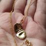 An elegant 925 sterling silver pendant on a chain. Image 8