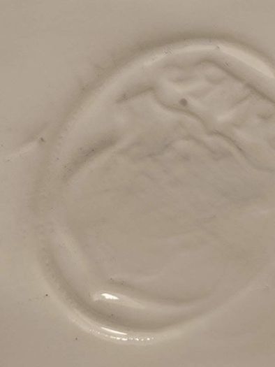 Rare find Cherub  Porcelain Horseshoe as flower vase held with child .