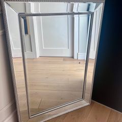 Brushed chrome ornate mirror