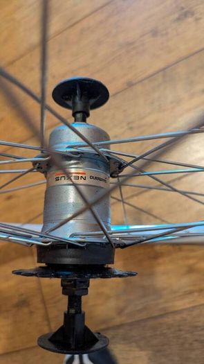 26" bike wheel with 3 speed Shimano nexus hub, cables , shifter