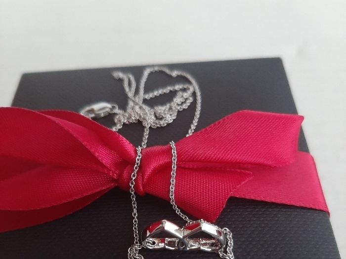 New silver pendant with real diamonds