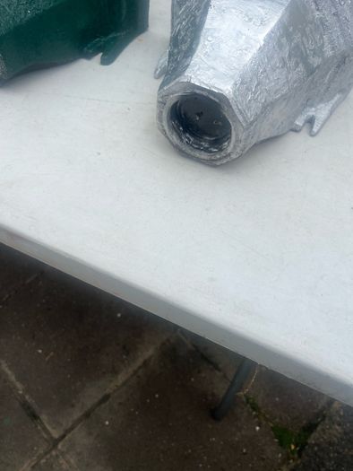 3 water hoppers converted to plant holders. With drainage