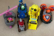 5 paw patrol cars with pups