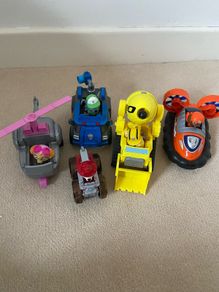 5 paw patrol cars with pups