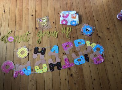 'Donut grow up' party decorations