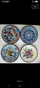 Vintage Tunisian ceramic wall plates set of 4 hand painted Nabeul pottery colorful Mediterranean