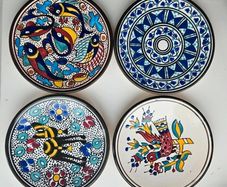 Vintage Tunisian ceramic wall plates set of 4 hand painted Nabeul pottery colorful Mediterranean
