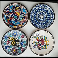Vintage Tunisian ceramic wall plates set of 4 hand painted Nabeul pottery colorful Mediterranean