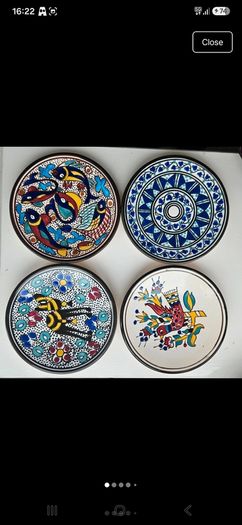 Vintage Tunisian ceramic wall plates set of 4 hand painted Nabeul pottery colorful Mediterranean
