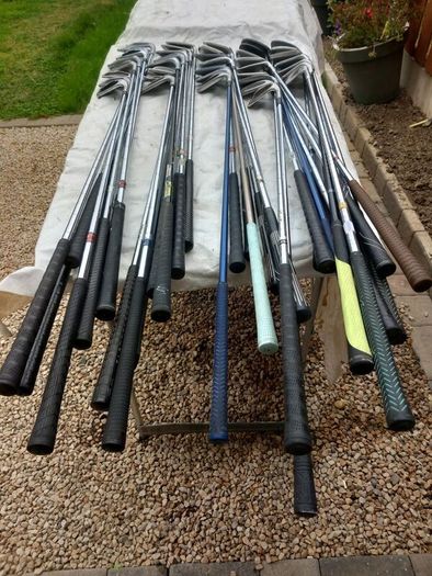 A selection of golf clubs and bags. NOT SELLING SEPARATE