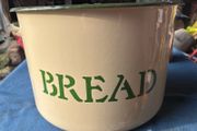 Vintage circular enamel bread bread