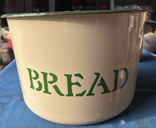 Vintage circular enamel bread bread