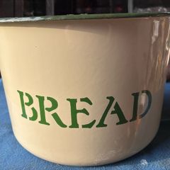 Vintage circular enamel bread bread