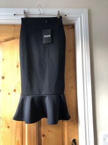 Black BRAND NEW fitted skirt