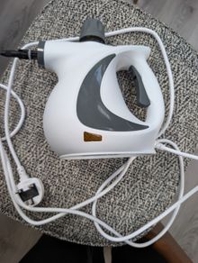 Hand held steam cleaner