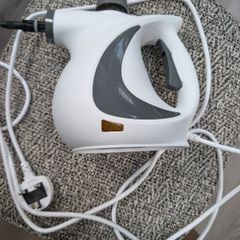 Hand held steam cleaner