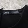 woman's black top Image 5