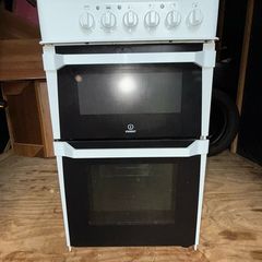 Electric stove and oven , 2 stands broken as seen in picture