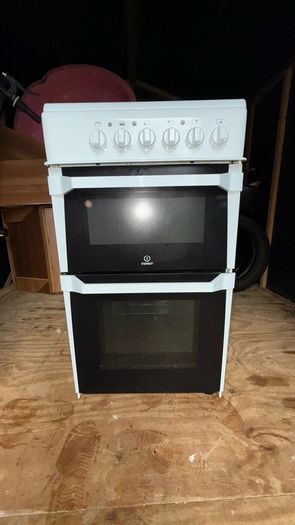 Electric stove and oven , 2 stands broken as seen in picture