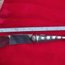 A collectible knife made of polished pewter with a stainless steel blade from Carrol Boyes. Image 7