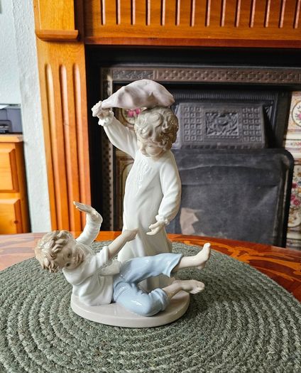 NAO by Lladro "Pillow Fight" Figurine